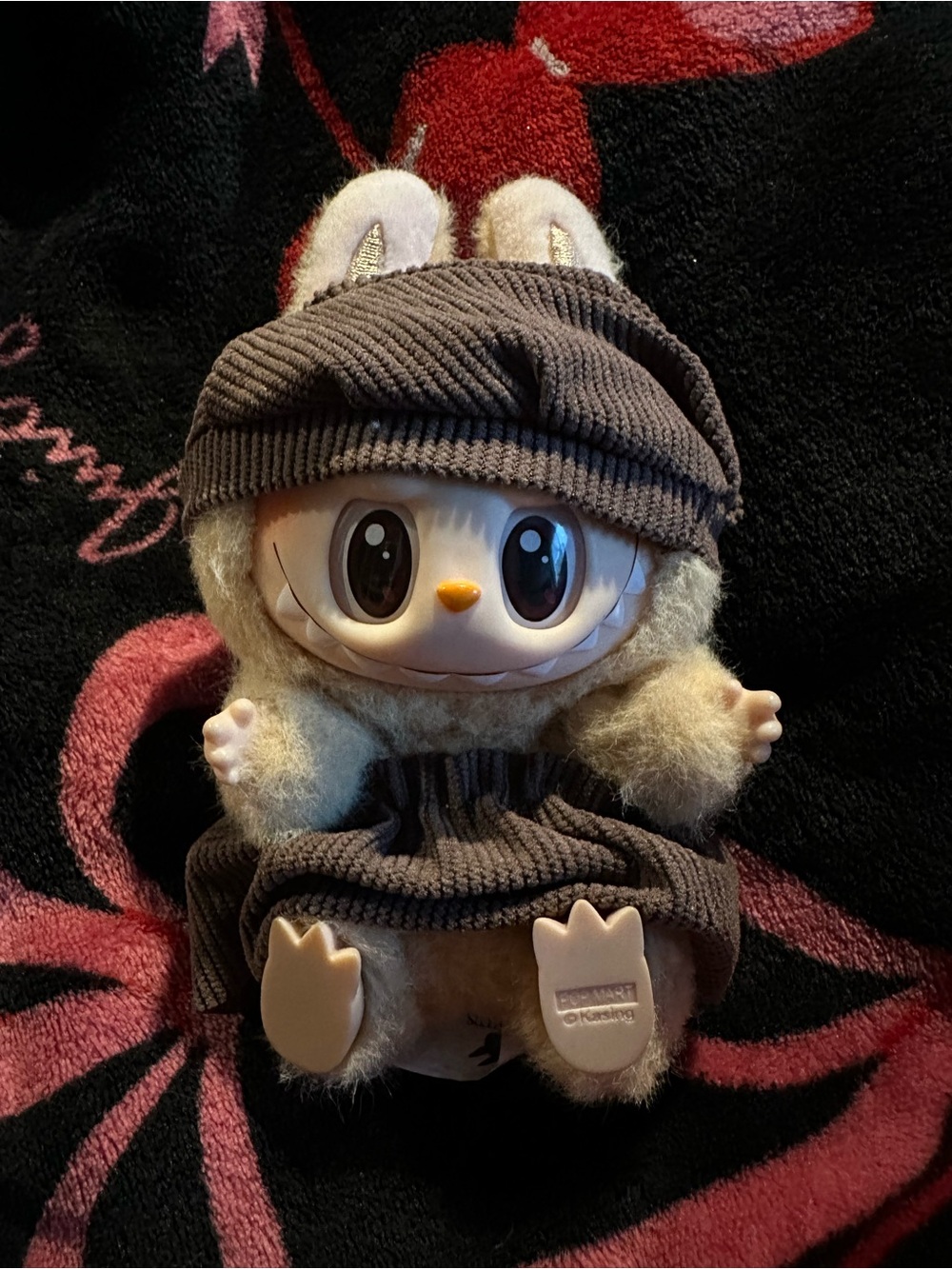 Doll in Brown Hat and skirt Outfit. Labubu